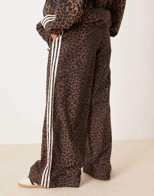 adidas Originals Firebird loose track pants in leopard print