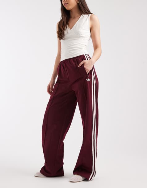 adidas Originals Firebird loose track pants in maroon and off white