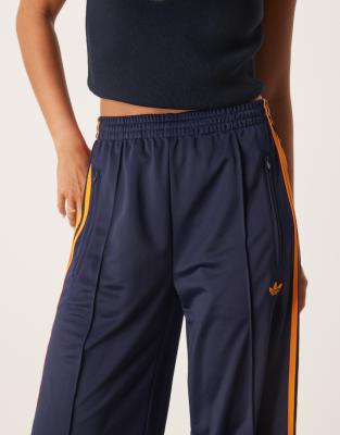 adidas Originals Firebird Loose track pants in navy and orange