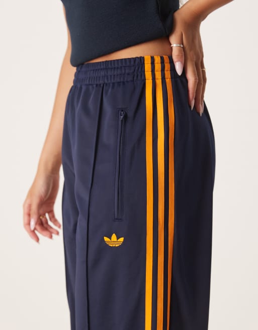 adidas Originals Firebird Loose track pants in navy and orange