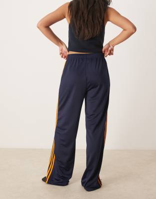 adidas Originals Firebird Loose track pants in navy and orange