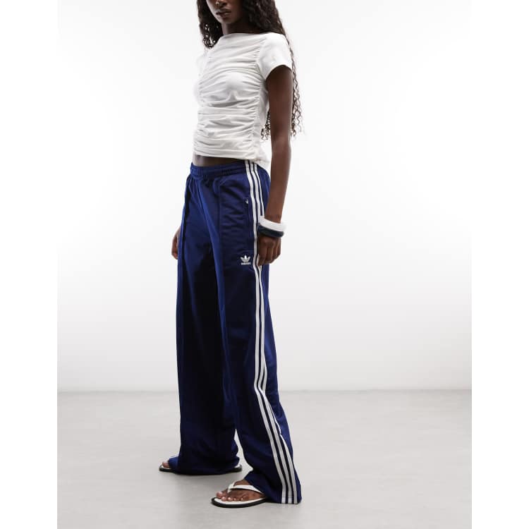 adidas Originals Firebird Loose track pants in navy | ASOS