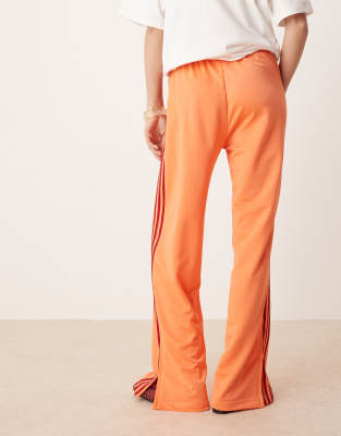 adidas Originals Firebird loose track pants in orange