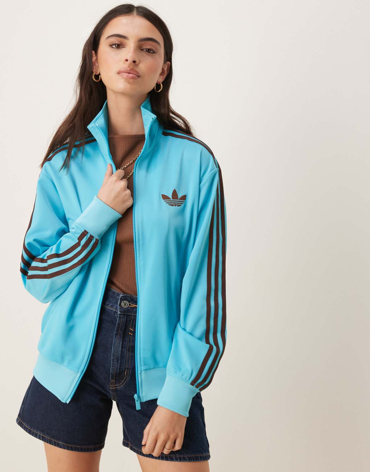 adidas Originals Firebird Loose track top in blue and brown