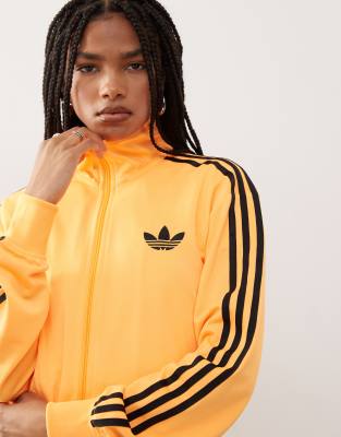 adidas Originals Firebird loose track top in flash orange and black