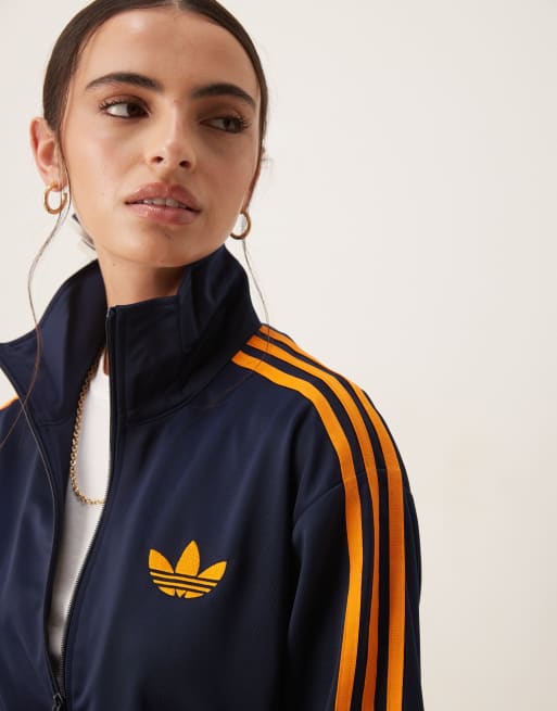 adidas Originals Firebird Loose track top in navy and orange