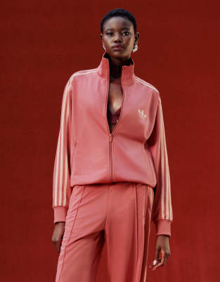 adidas Originals adidas Originals Firebird Loose track top in pink- exclusive to ASOS-Red