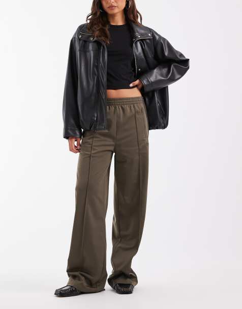 adidas Originals Firebird losse trainingsbroek in donkerkaki en zwart - view 1