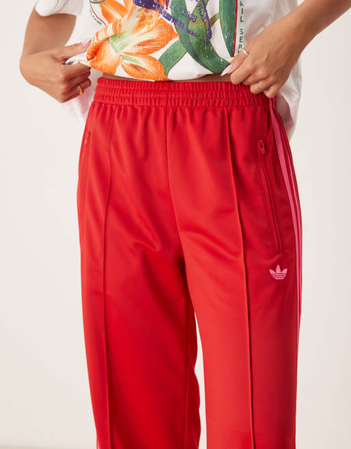 adidas Originals Firebird Losse trainingsbroek in rood en roze