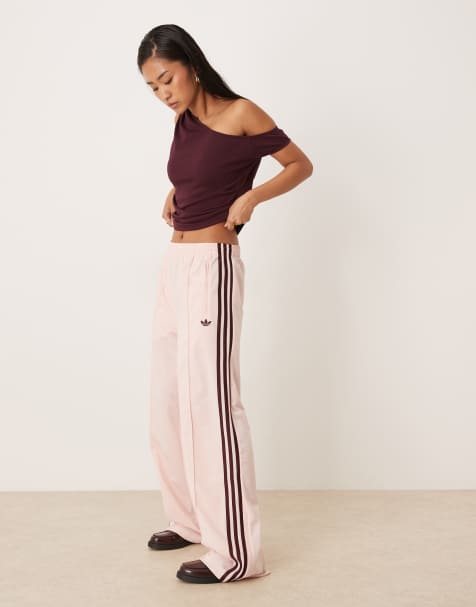 adidas Originals - Firebird - Losse trainingsbroek in roze en kastanjebruin - view 1