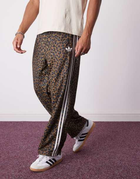adidas Originals - Firebird - Losvallende trainingsbroek met luipaardprint in brons - view 1