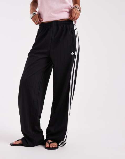 adidas Originals Firebird løse træningsbukser i sort pinstripe - view 1