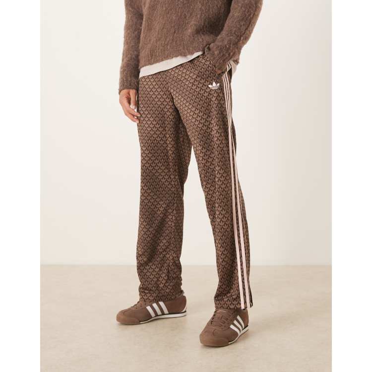 adidas Originals Firebird monogram track pants in brown | ASOS