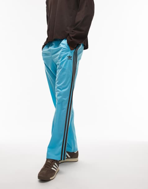 adidas Originals Firebird track pants in blue and brown