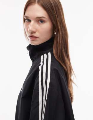 adidas Originals Firebird oversized woven track top in black | ASOS