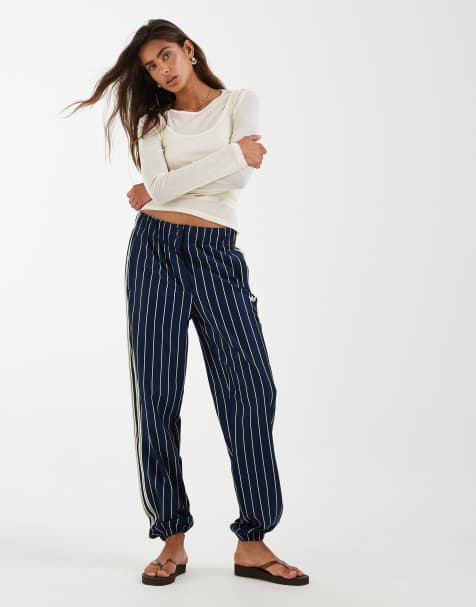 adidas Originals - Firebird - Pantalon de survêtement à fines rayures - Indigo nuit/vanille chaud - view 1