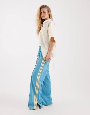 Firebird - Pantalon de survêtement ample - Bleu clair et jaune M