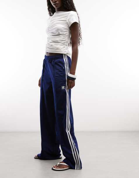 adidas Originals Firebird pantalones de chándal holgados en azul marino - view 1
