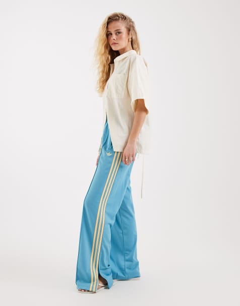 adidas Originals - Firebird - Pantaloni sportivi ampi blu chiaro e gialli - view 1