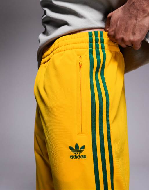 adidas Originals Firebird Pantaloni sportivi gialli ASOS