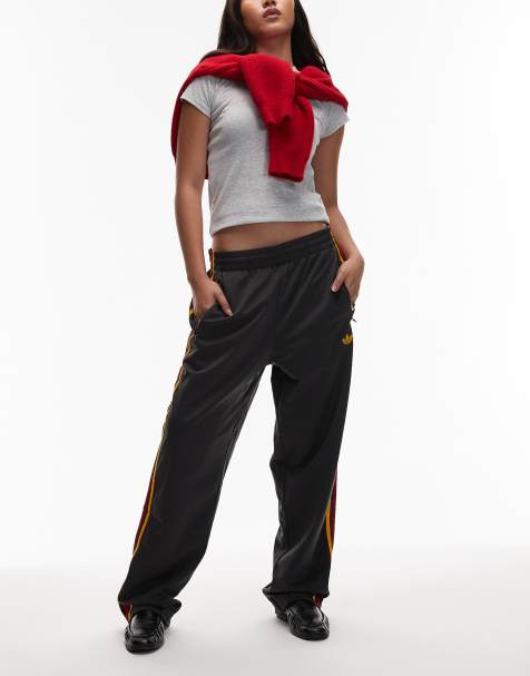 adidas Originals - Firebird - Pantaloni sportivi neri e oro - view 1