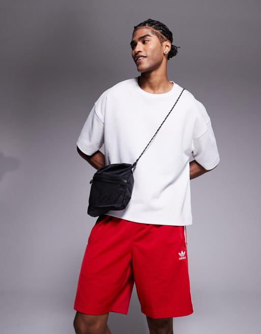 adidas Originals Firebird shorts in red