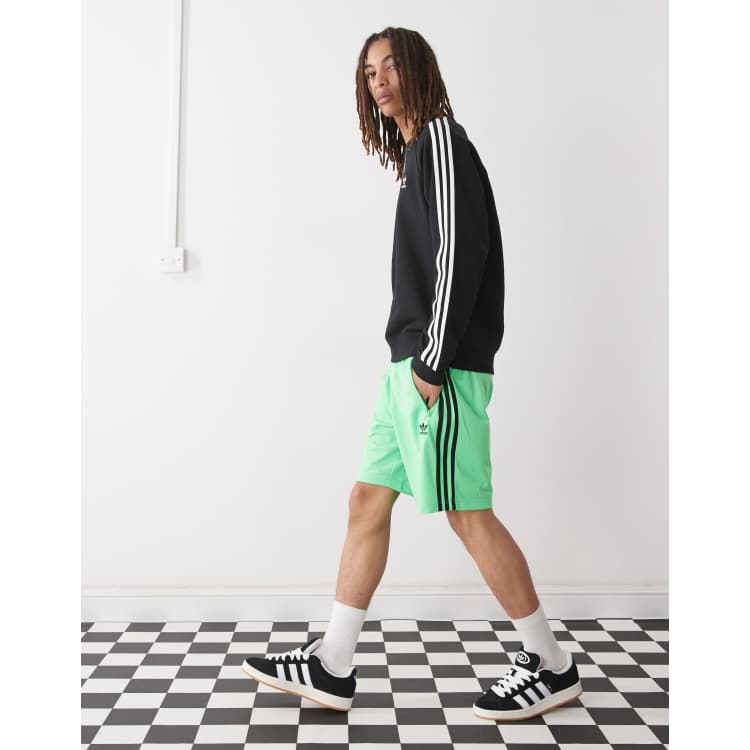 adidas Originals Firebird shorts in green and black ASOS