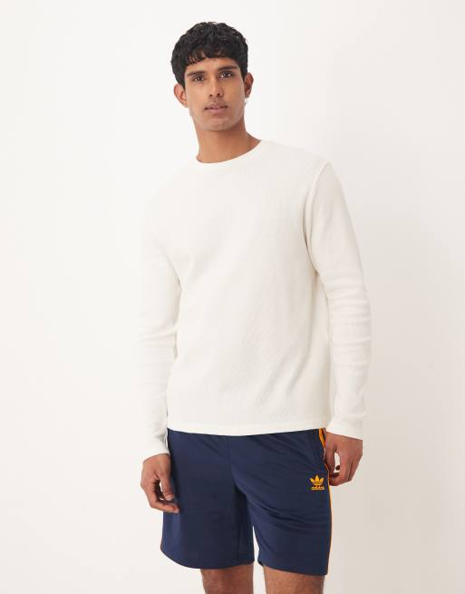 adidas Originals – Firebird – Shorts in Marineblau und Orange