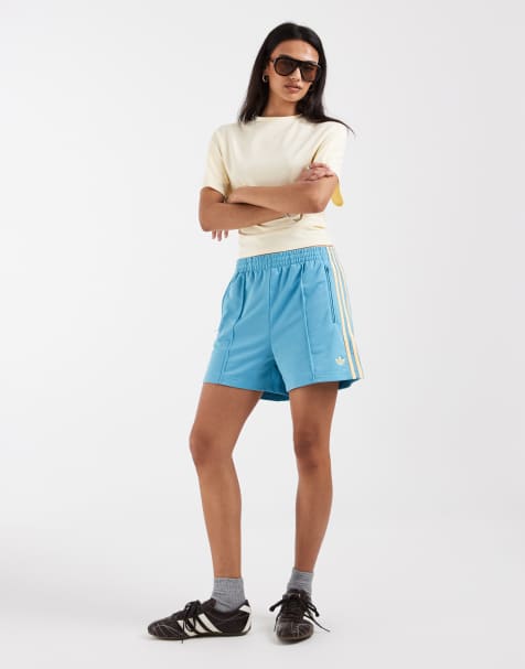adidas Originals Firebird shorts in turquoise and yellow - view 1