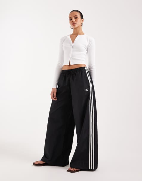 adidas Originals – Firebird – Svarta och vita träningsbyxor med vida ben - view 1