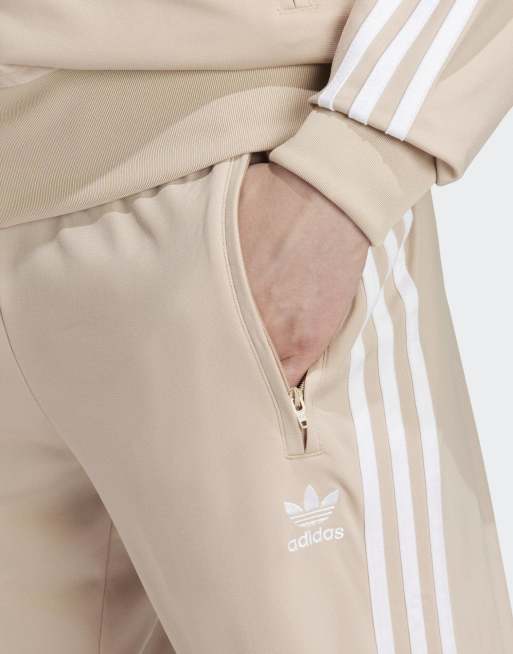 adidas Originals Firebird track pants in beige ASOS