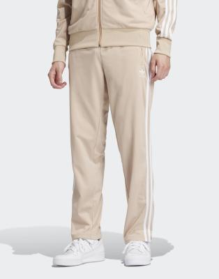 ★adidas★ 70s track pants beige IX5221 Clothing - Adicolor 70s Track Pants - Beige | adidas Kuwait