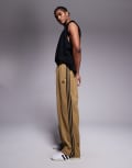 [adidas Originals] adidas Originals Firebird track pants in beige-Neutral S beige/black