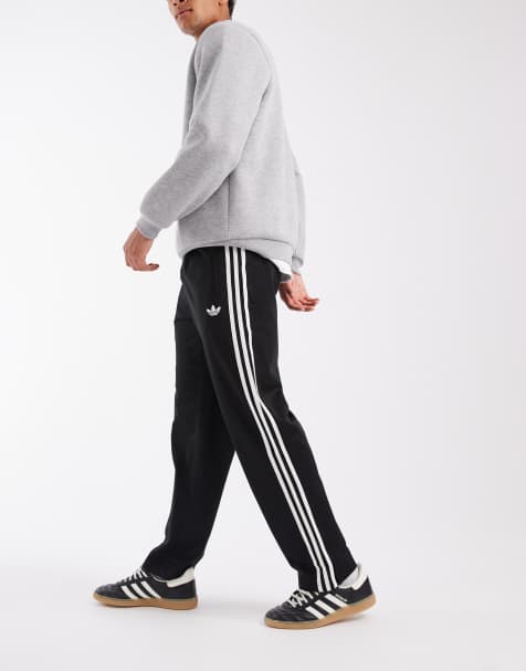 adidas Originals Firebird track pants in black
