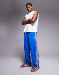 [adidas Originals] adidas Originals Firebird track pants in blue XS Light blue
