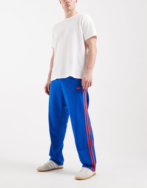 adidas Originals Firebird track pants in blue - view 1