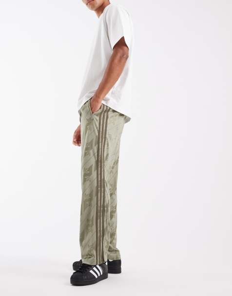 adidas Originals firebird track pants in khaki monogram - view 1