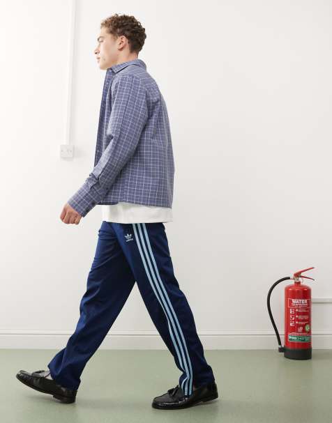 adidas Originals Firebird track pants in navy and blue - view 1