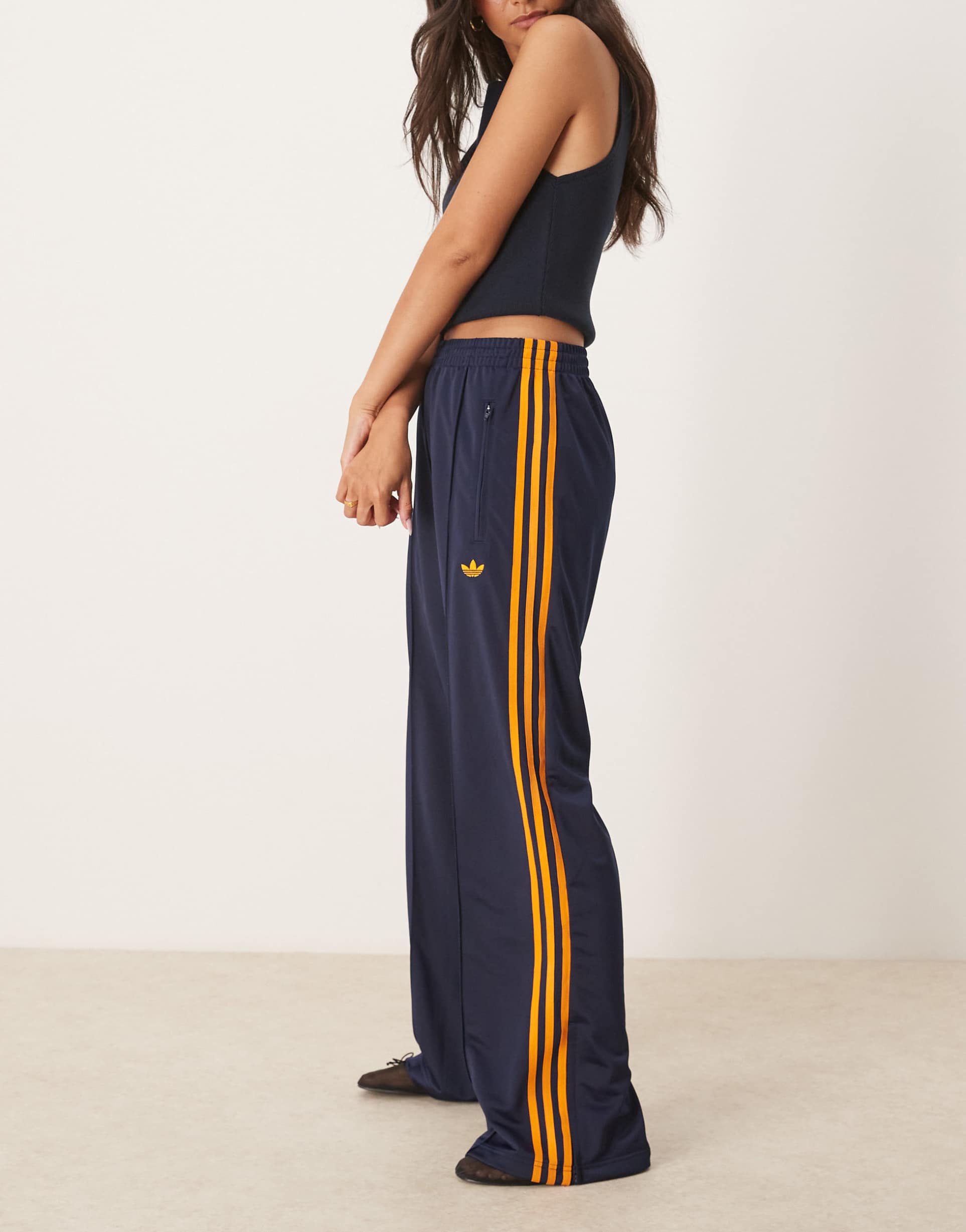 adidas originals firebird track pants in navy and orange