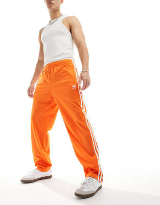 adidas Originals adidas Originals Firebird track pants in orange