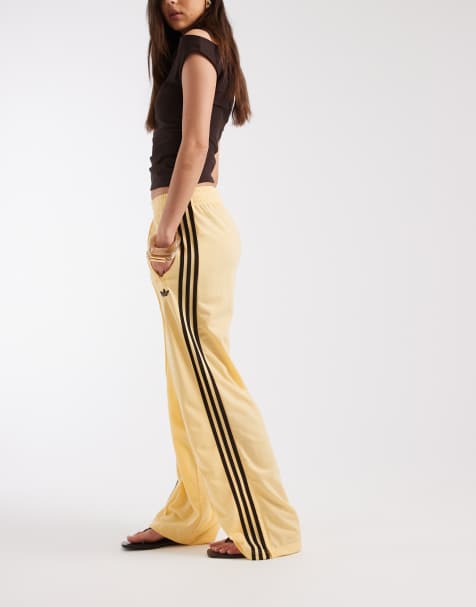 adidas Originals Firebird track pants in yellow and brown - view 1