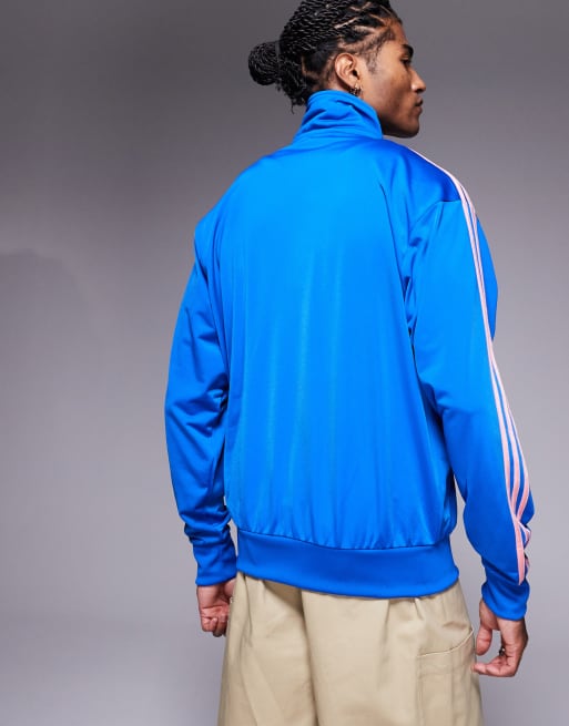 adidas Originals Firebird track top in blue and pink