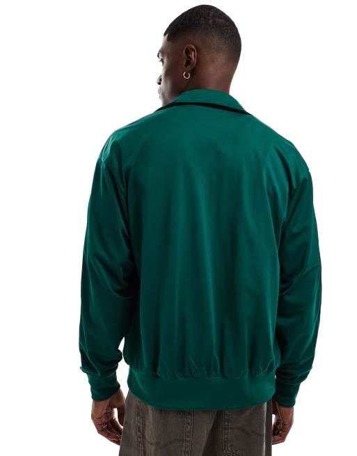 adidas Originals Firebird track top in green