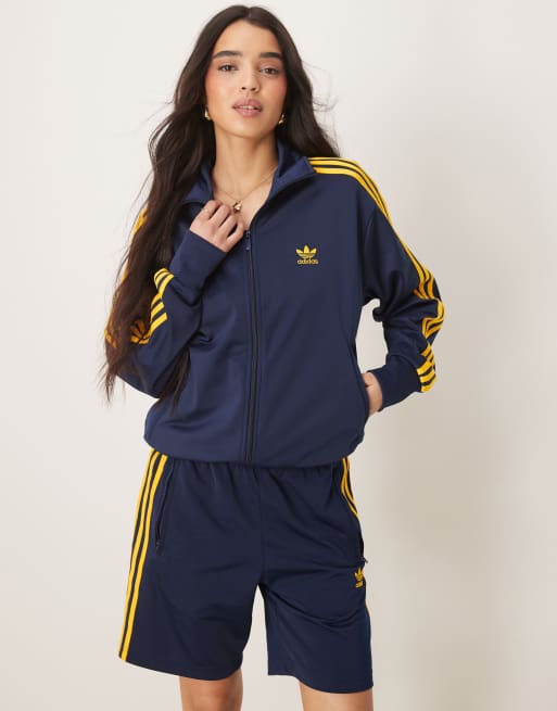 adidas Originals Firebird track top in navy and yellow