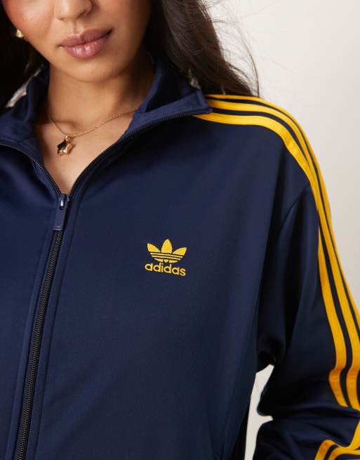 adidas Originals Firebird track top in navy and yellow