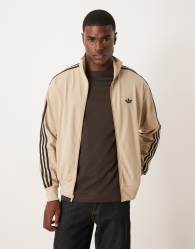 adidas Originals Firebird track top in stone