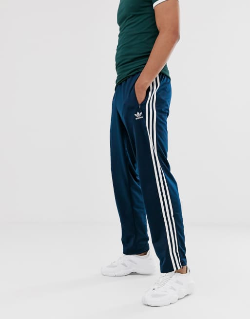 adidas Originals Firebird in navy ASOS