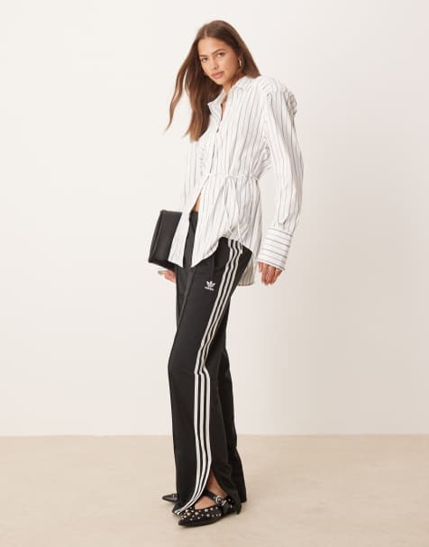 adidas Originals Firebird trackpants in black - view 1