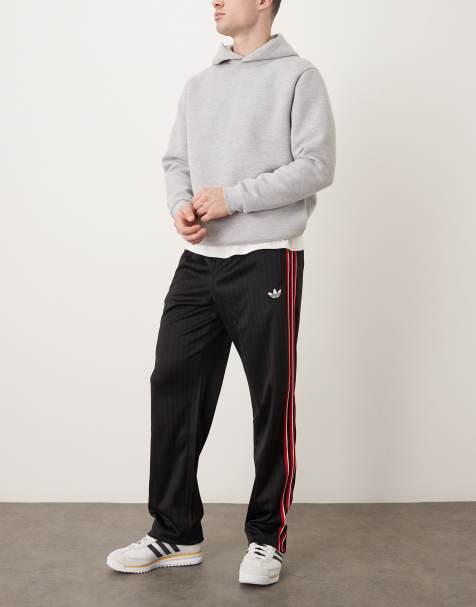 adidas Originals Firebird trackpants in black - view 1
