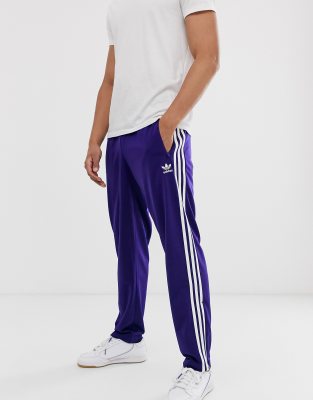 purple adidas track pants